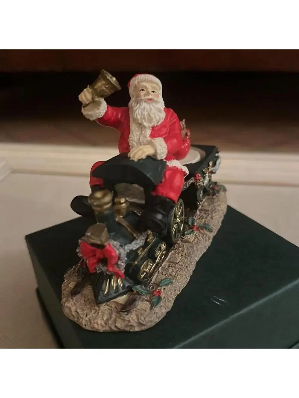 Vintage Santa Claus figurine riding a train w presents